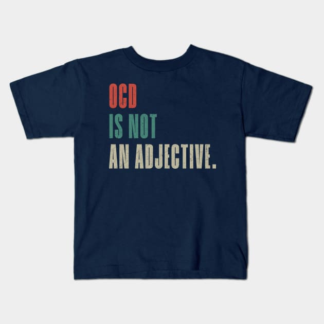 OCD Is Not An Adjective. Obsessive Compulsive Disorder Vintage Kids T-Shirt by Mas To